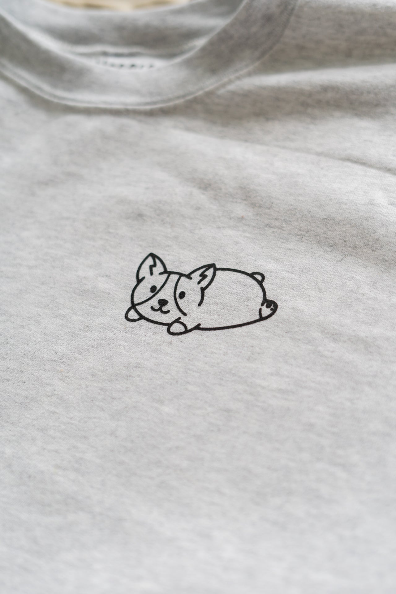 Corgi Splooting Cotton & Polyester Crewneck Sweatshirt in Sand or Grey